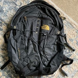 Black/Gold North Face Backpack